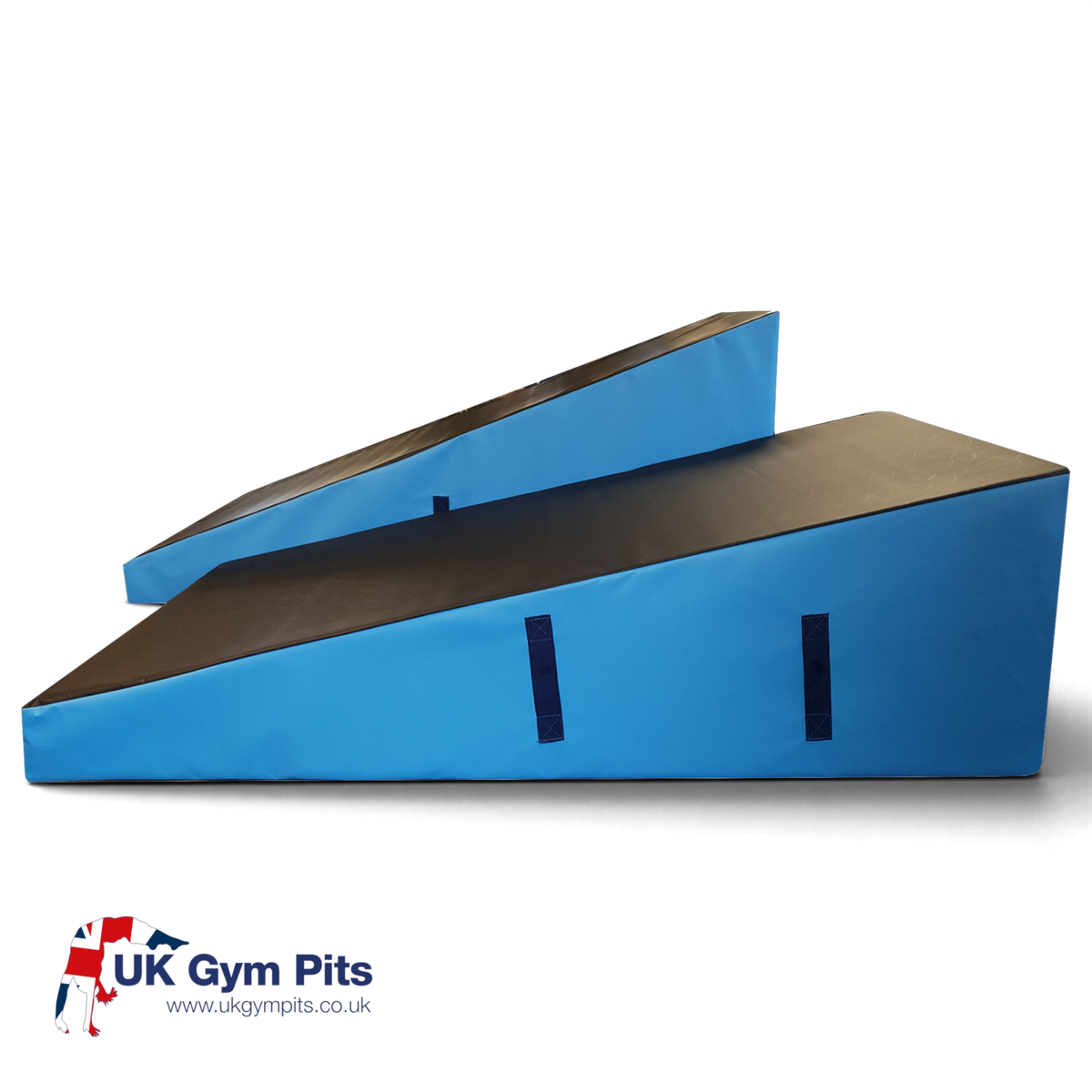 UK Gym Pits parkour wedge blocks in black and blue with carry handles for freestyle gymnastics and obstacle training.