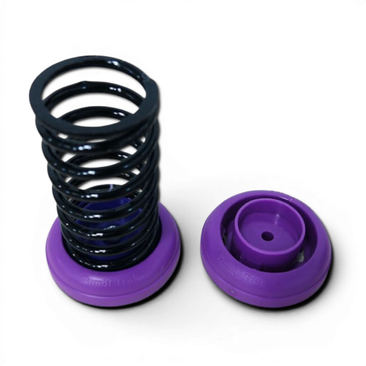 UK Gym Pits high carbon steel power spring and purple plastic base mount for cheerleading sprung floor systems.