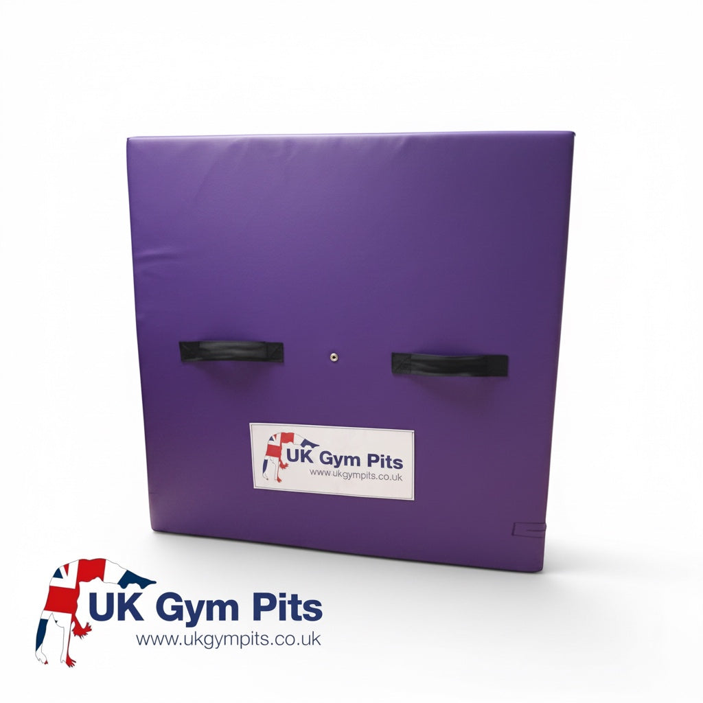 UK Gym Pits purple PVC spotting and coaching block with heavy-duty handles and anti-slip base for gymnastics training