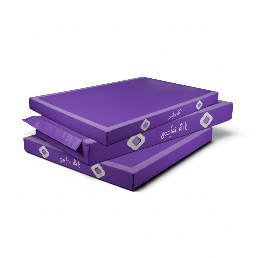 UK Gym Pits Gaofei purple gymnastics landing mats stacked, featuring durable PVC vinyl and air distribution mesh.