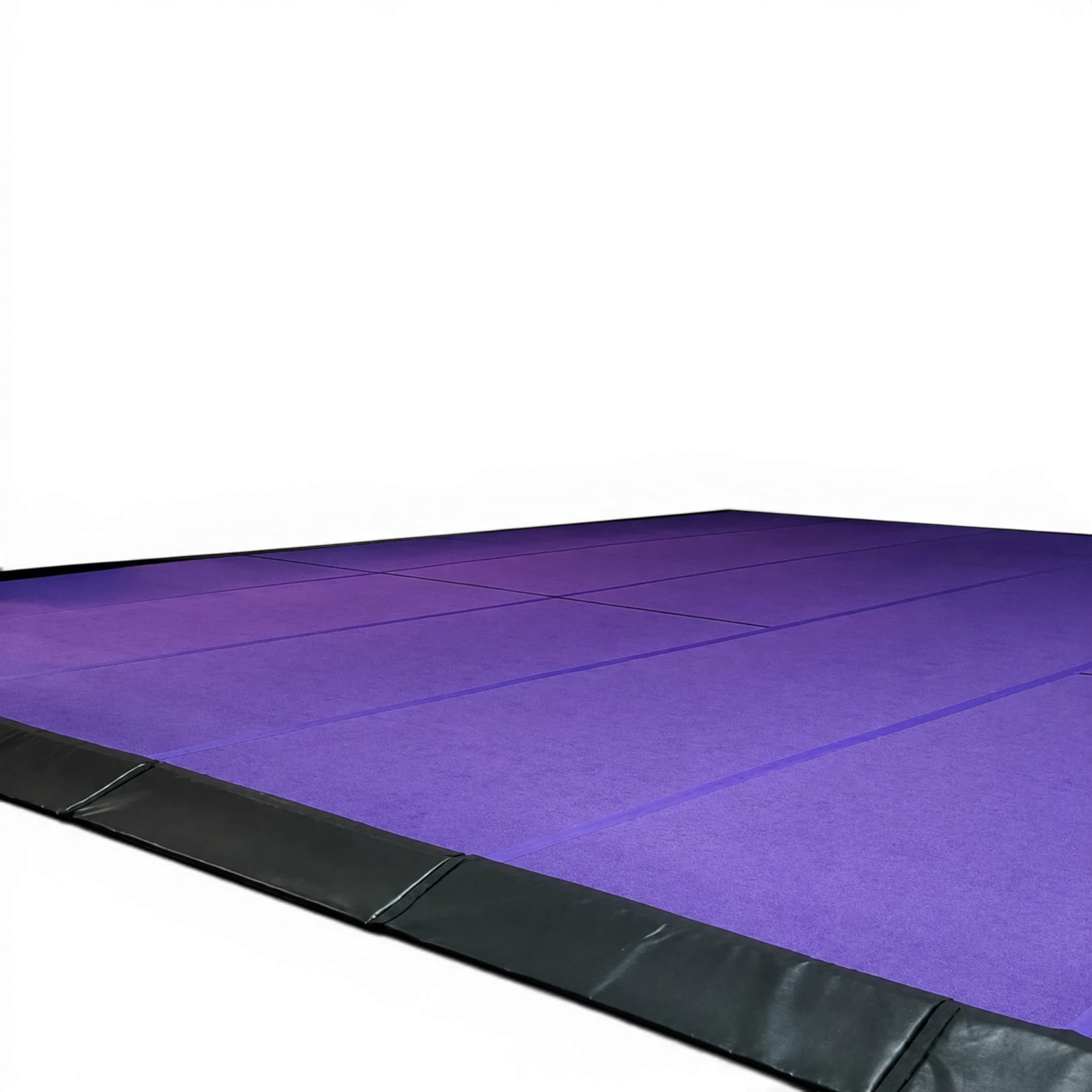 UK Gym Pits 12.8m purple carpeted gymnastics sprung floor with black side skirts for training and competition.