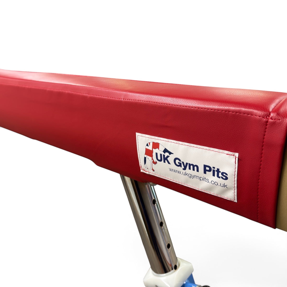 UK Gym Pits red cushioned gymnastics beam mat with Velcro tabs and anti-slip faux leather surface