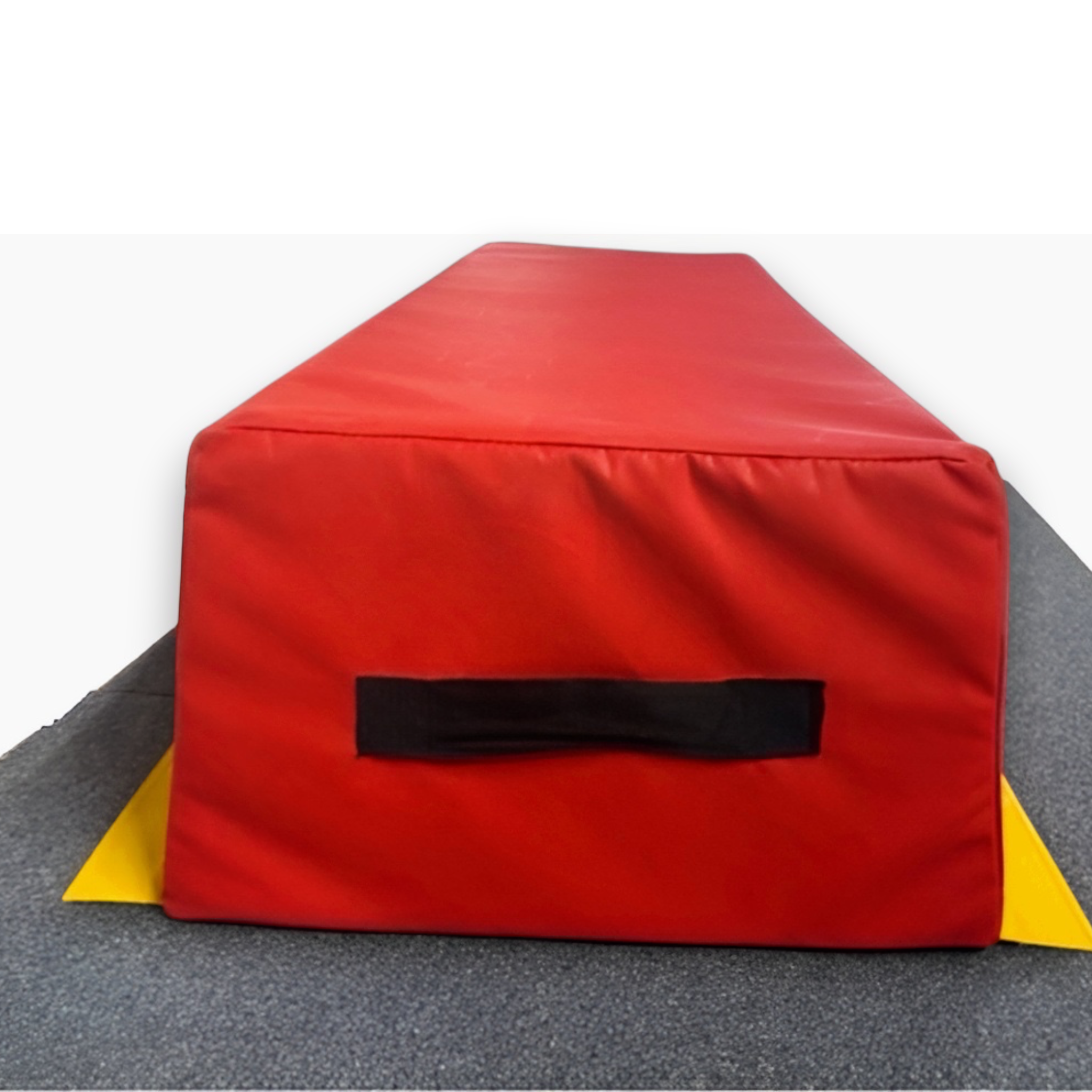 UK Gym Pits red foam vault box section with a black carrying handle, designed for gymnastics and soft play training.