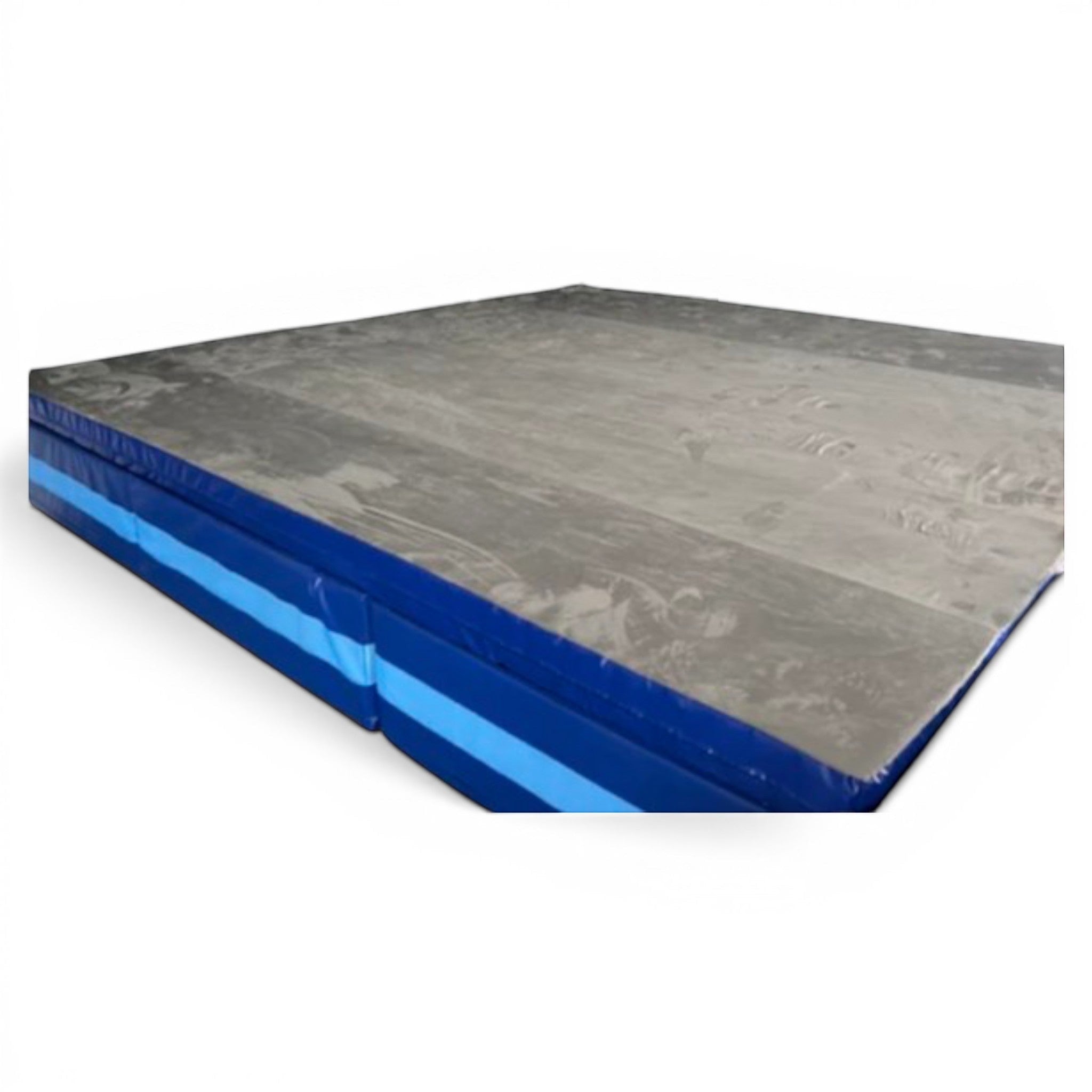 UK Gym Pits resi foam landing module with a grey top mat and blue PVC base sections for gymnastics and parkour.