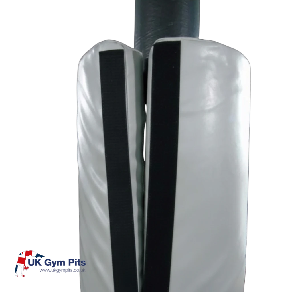 UK Gym Pits round grey foam post protector with Velcro fastening wrapped around a steel gym stanchion