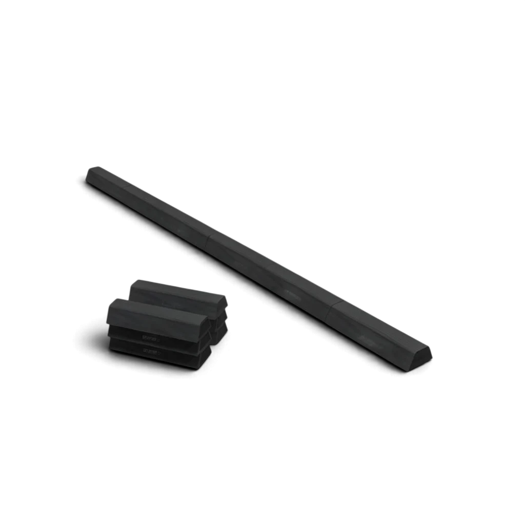 UK Gym Pits segmented PE foam floor beam in black with six connectable sections and anti-slip base for gymnastics.