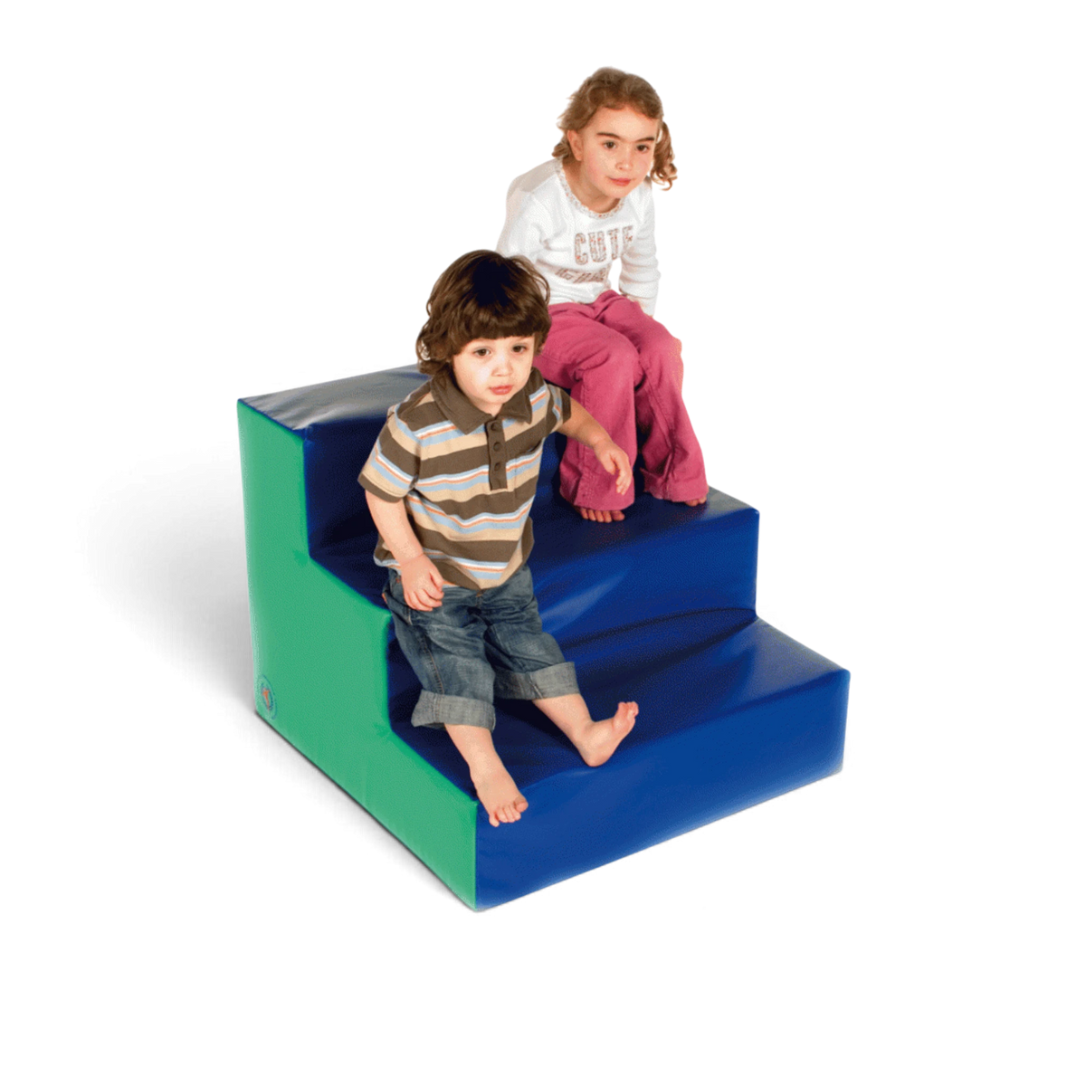 Two children sitting on UK Gym Pits blue and green soft play steps designed for gross motor skill development.