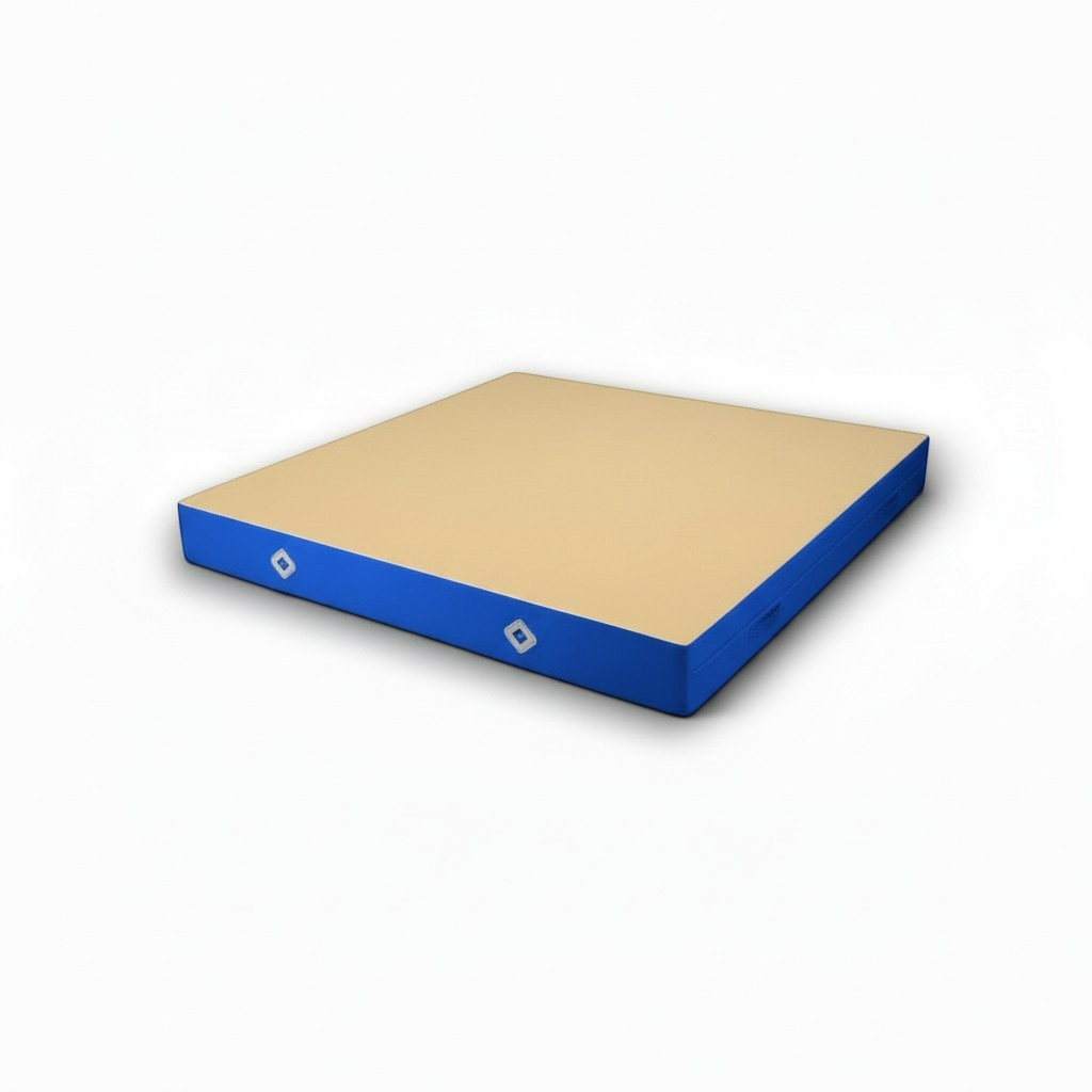 UK Gym Pits FIG approved soft topper gymnastics landing mat with a beige jersey top and blue PVC sides.