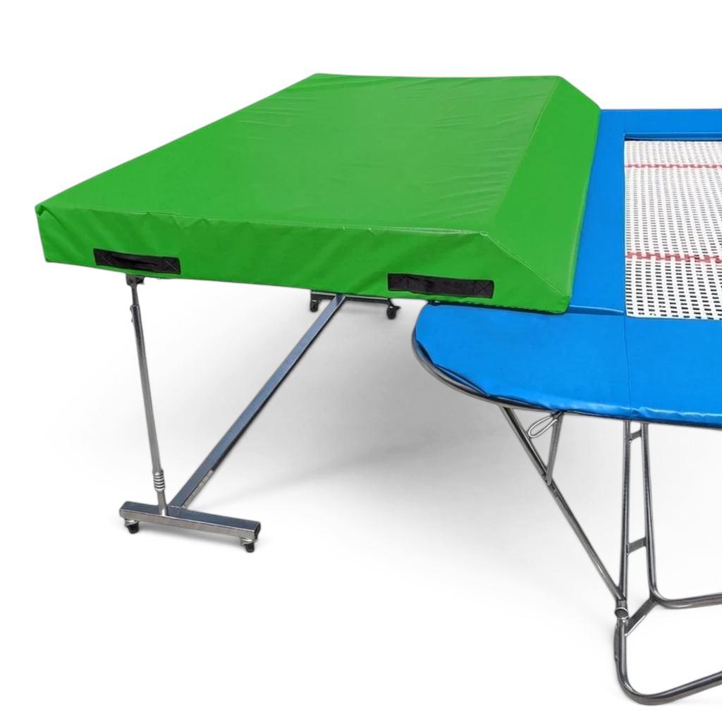 UK Gym Pits standard spotting end deck with a green safety mat attached to a trampoline frame with a silver metal base.