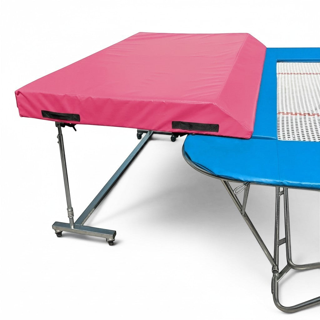 UK Gym Pits standard spotting end deck with a pink wedged safety mat attached to a trampoline frame