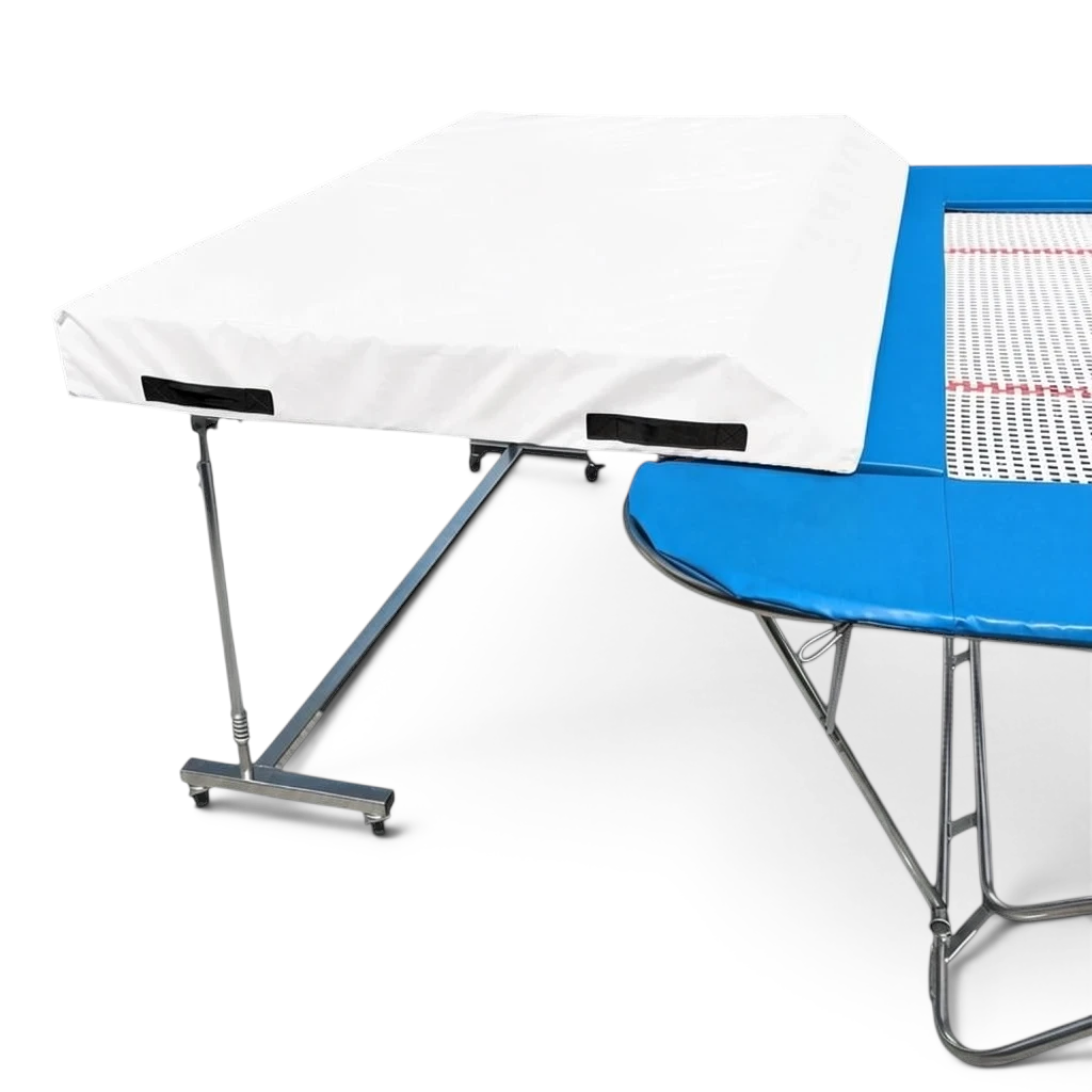 UK Gym Pits standard spotting end deck with white safety mat and silver folding frame attached to a trampoline