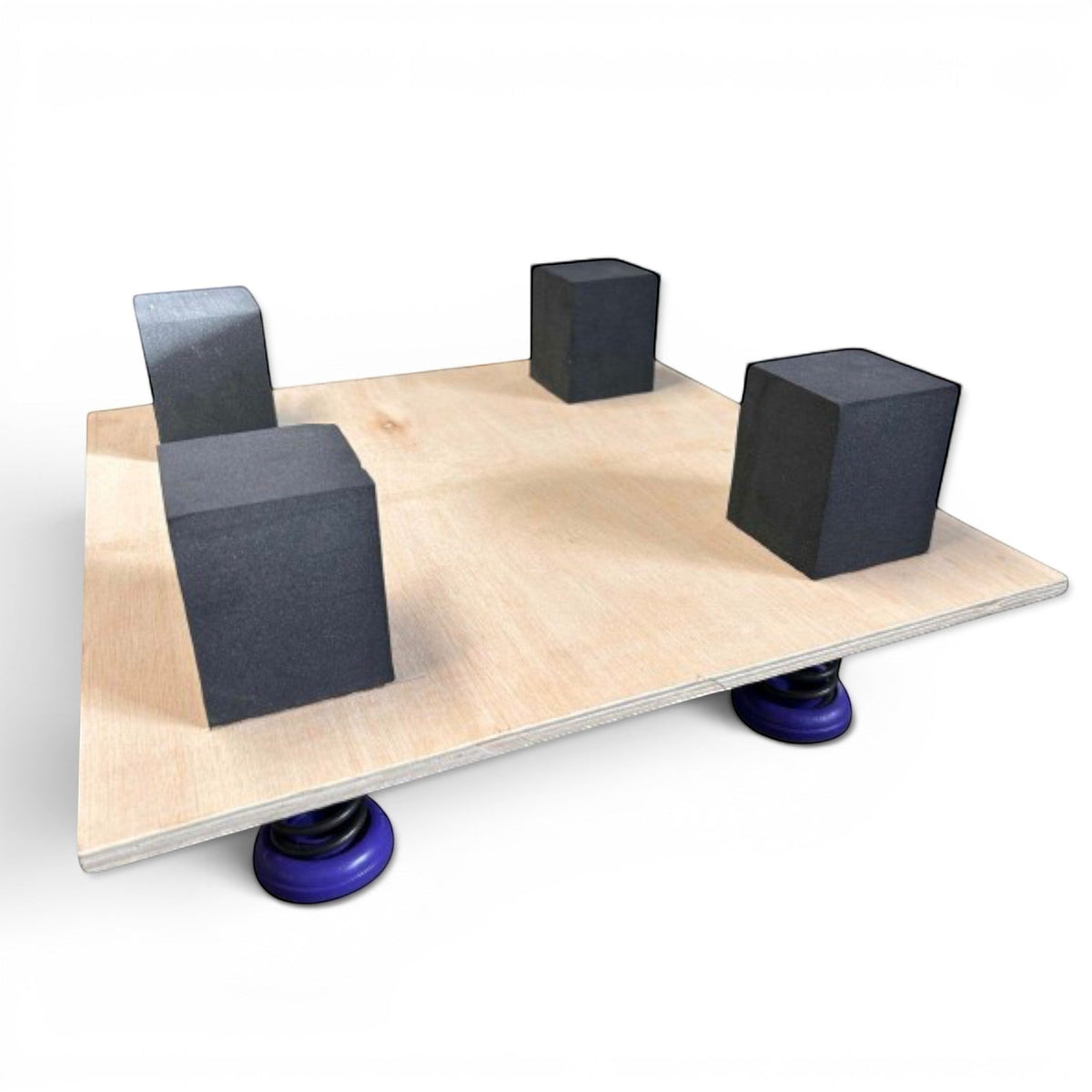 UK Gym Pits sprung tumble floor section showing plywood base with blue power springs and black EPDM foam blocks