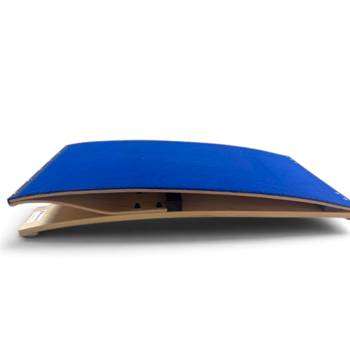 UK Gym Pits standard gymnastics springboard with blue antimicrobial carpet and birch plywood base, side view