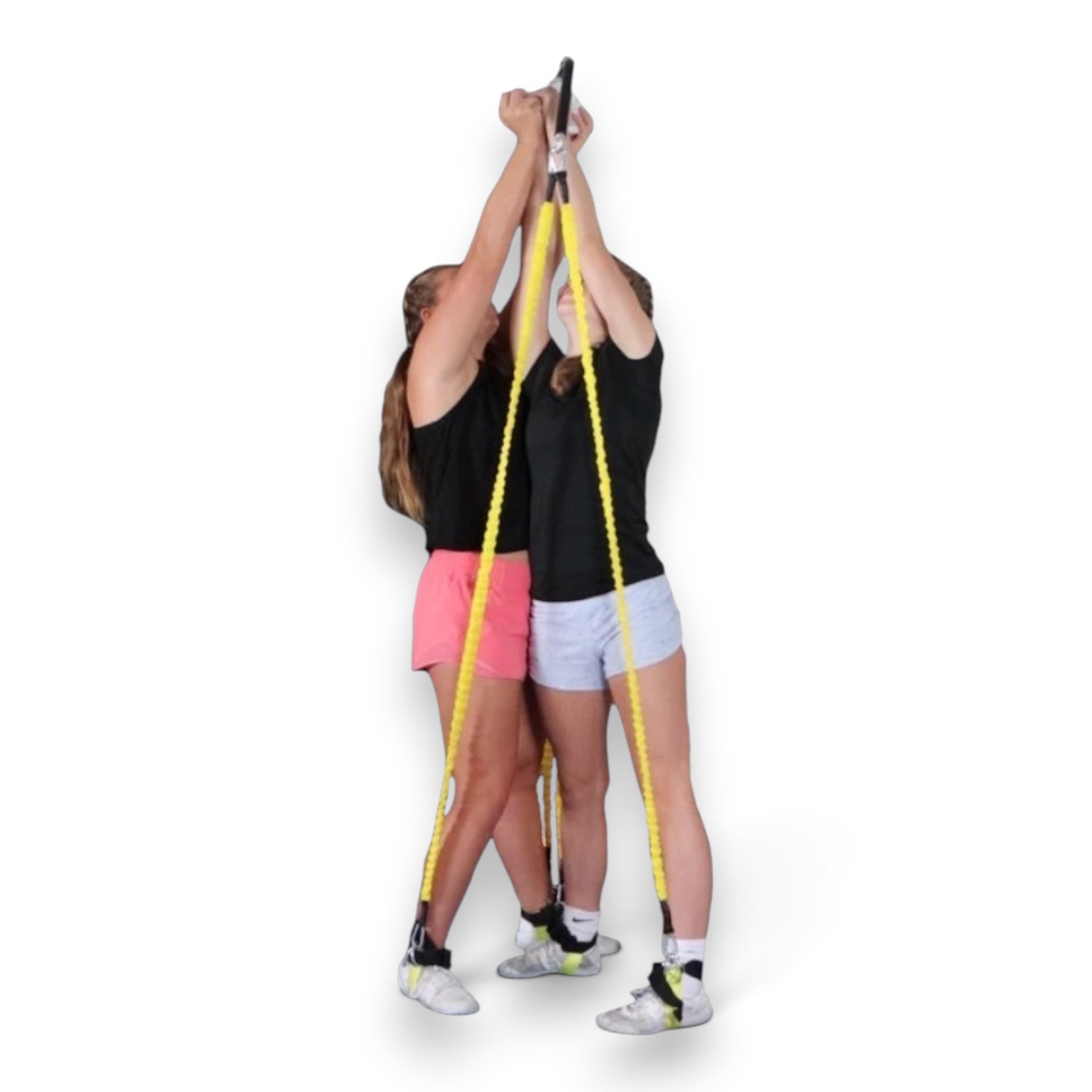 Two cheerleaders using the UK Gym Pits Stunt Double trainer with yellow resistance bungees to practice lifting