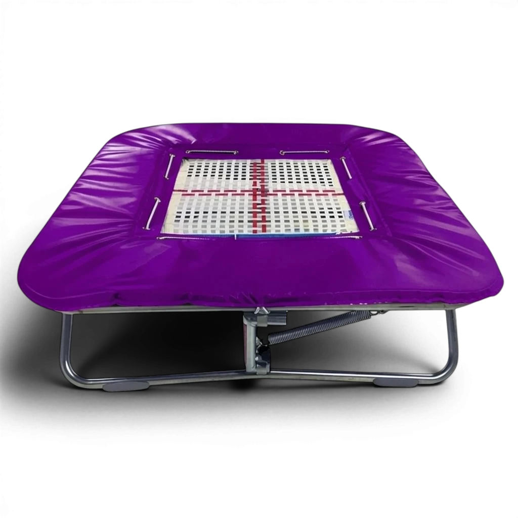 UK Gym Pits super mini trampoline with a white web bed and purple protective frame pads on a zinc plated steel frame.