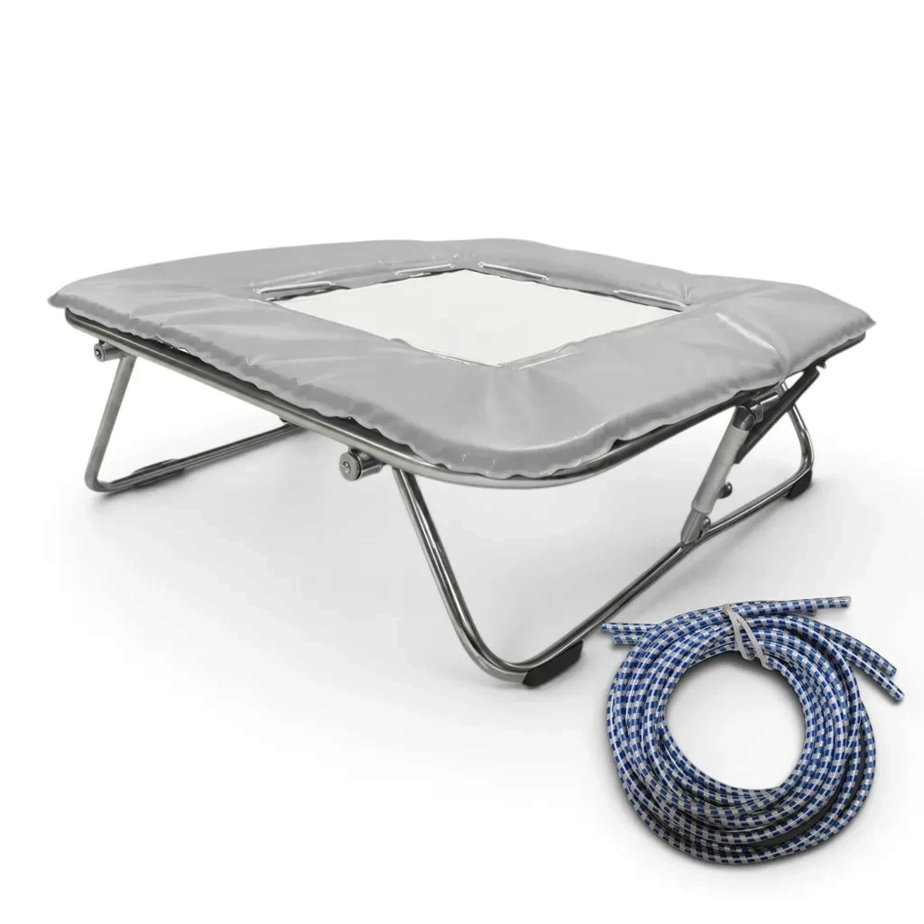 UK Gym Pits super mini trampoline with a solid super-mesh bed, grey frame pads, and a coil of blue rubber cables.