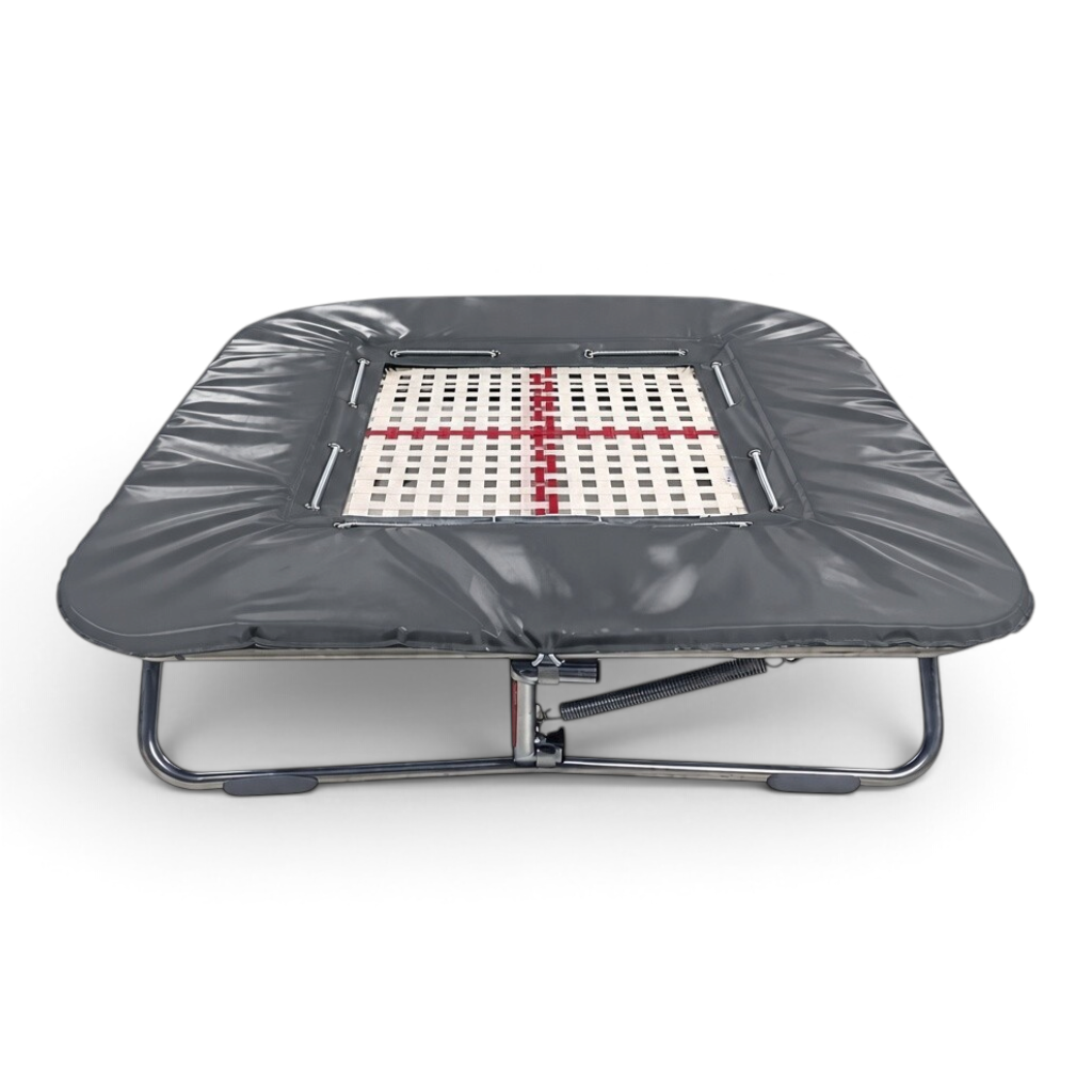 UK Gym Pits super mini tramp with a 25mm web bed and grey protective frame pads on a foldable steel frame.