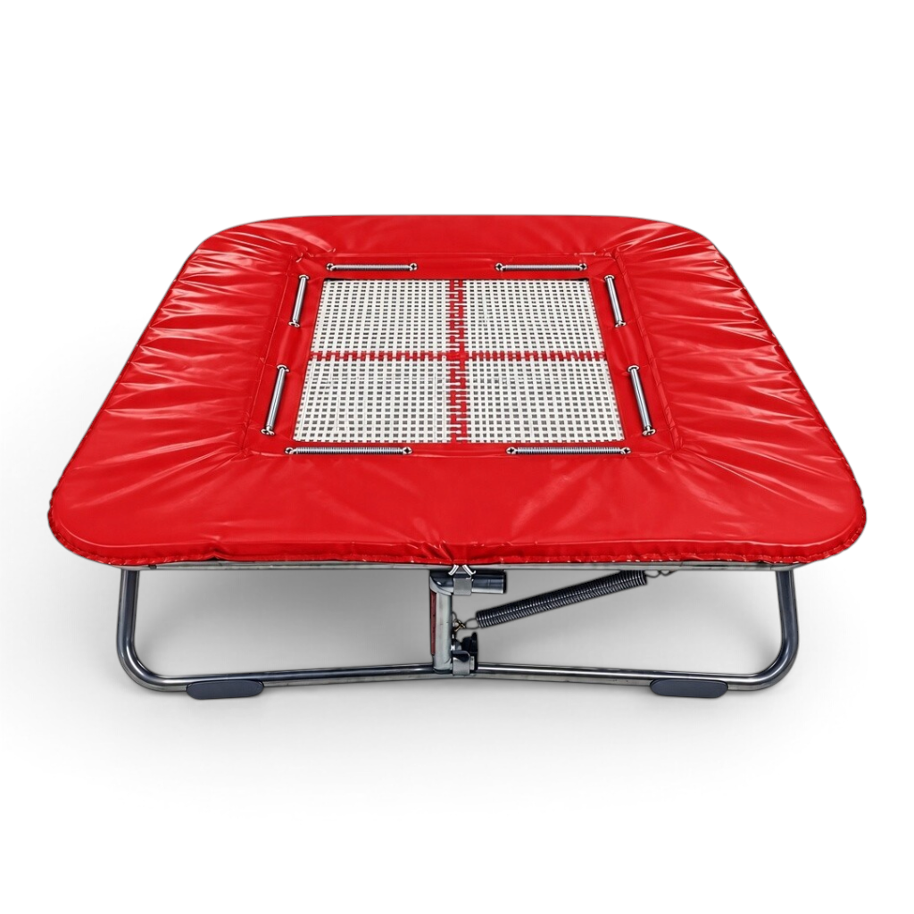 UK Gym Pits super mini trampoline with a white web bed and vibrant red protective frame pads on a steel frame.