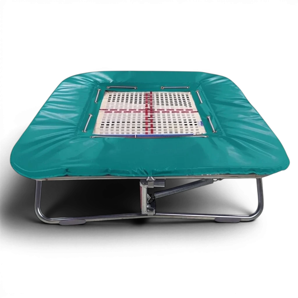 UK Gym Pits super mini trampoline with a web bed and teal protective frame pads on a black background.