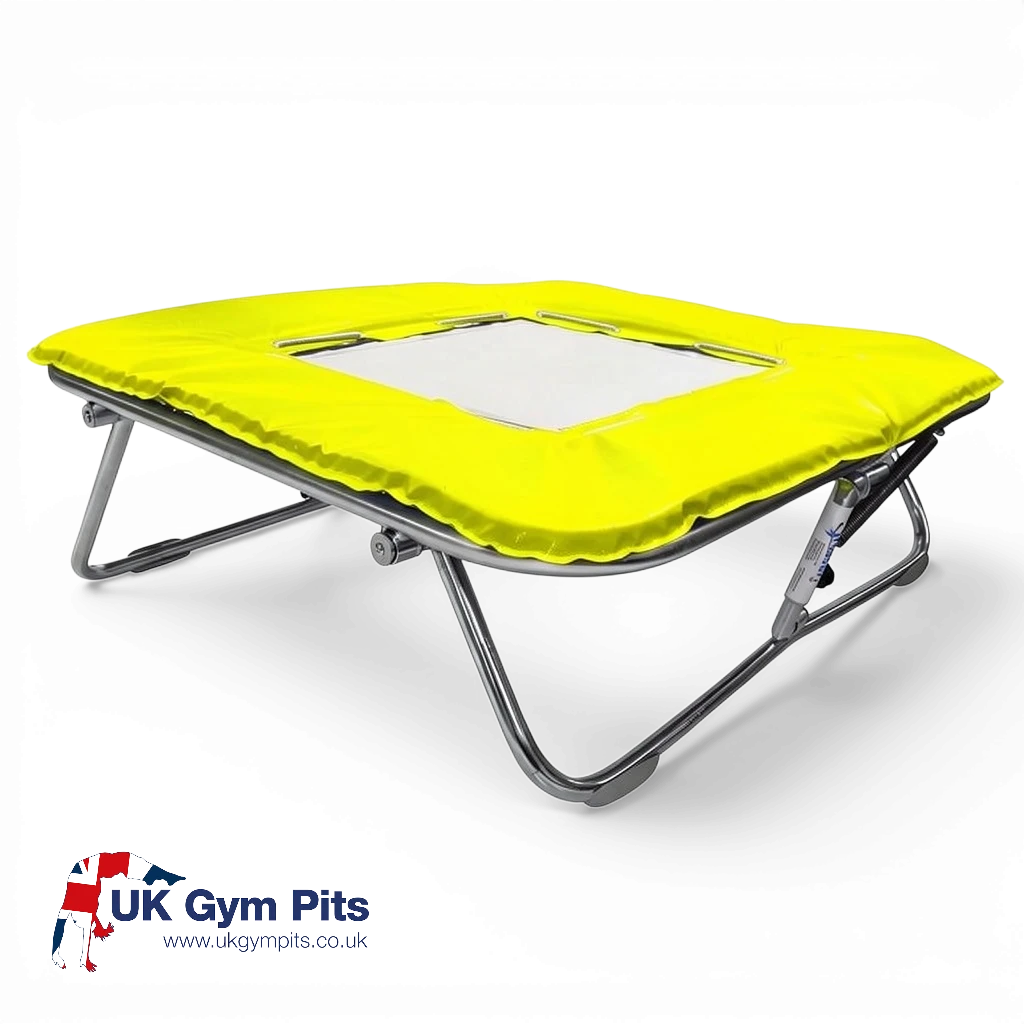 UK Gym Pits super mini trampoline with a solid super-mesh bed and bright yellow protective frame pads