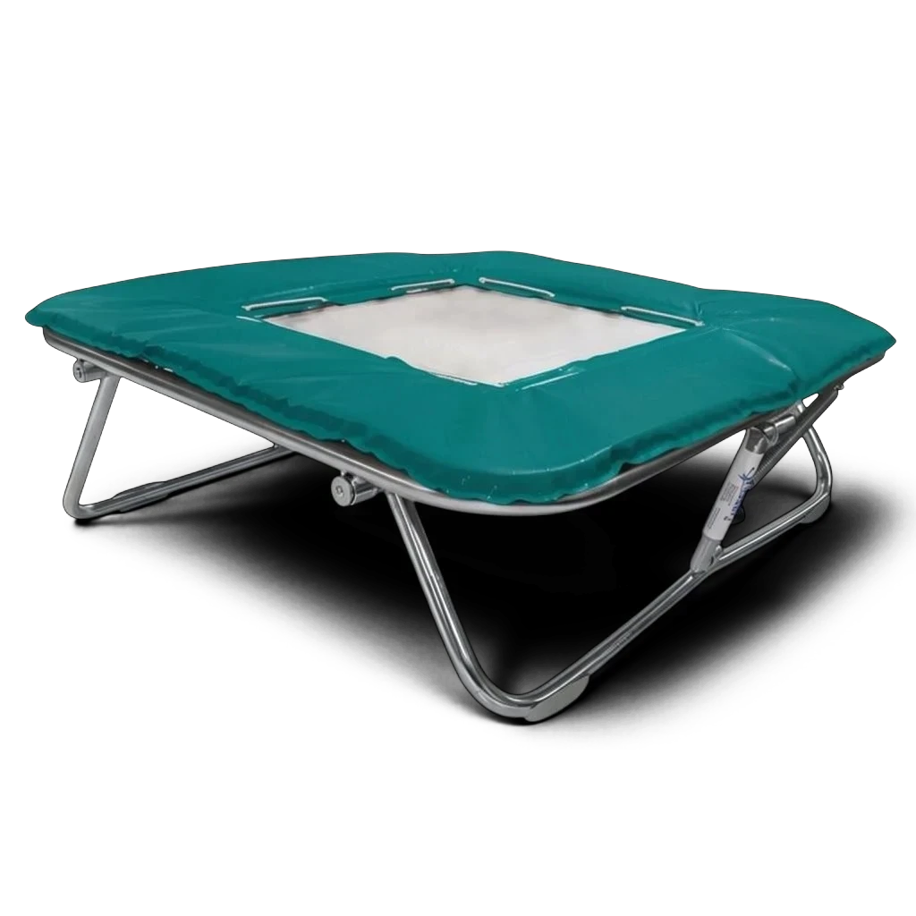UK Gym Pits super mini trampoline with a solid super-mesh bed and teal protective frame padding on a metal frame.