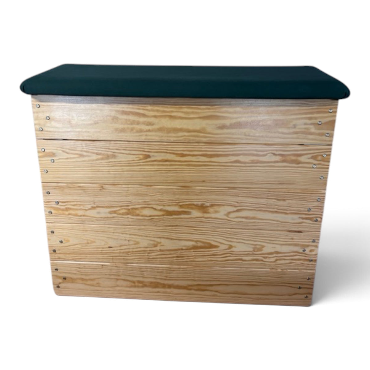 UK Gym Pits timber vault box with natural wood finish and a padded dark green top for gymnastics training.