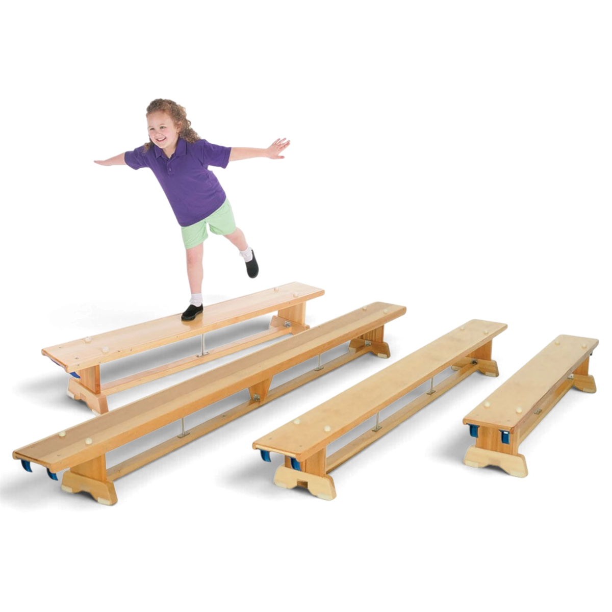 UK Gym Pits traditional wooden balance benches in various lengths with a young girl balancing on one in a gym setting