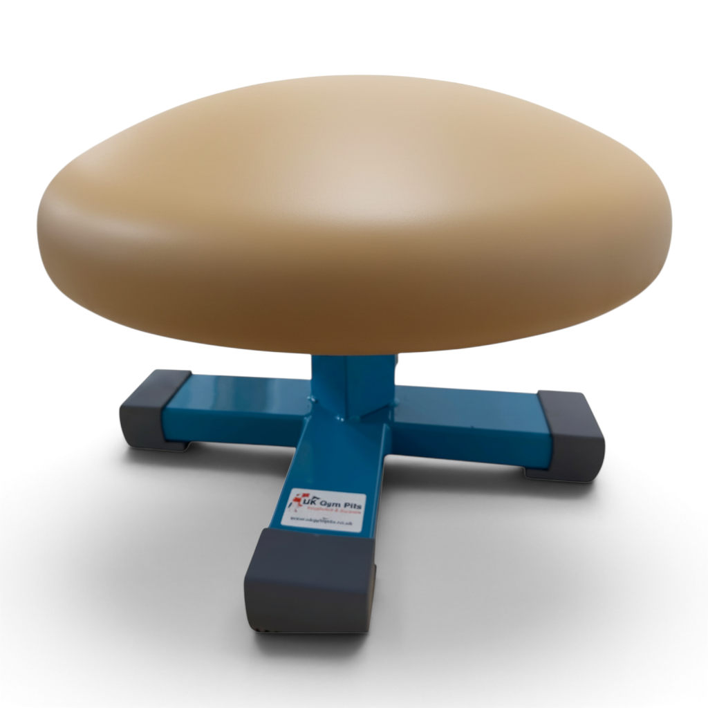 UK Gym Pits training mushroom with a tan leatherette top and blue steel base, designed for gymnastics practice.