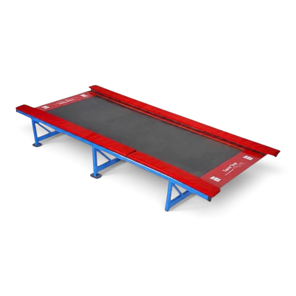 UK Gym Pits Tumbl Trak replacement bed featuring a durable black jumping surface with red padded side rails.