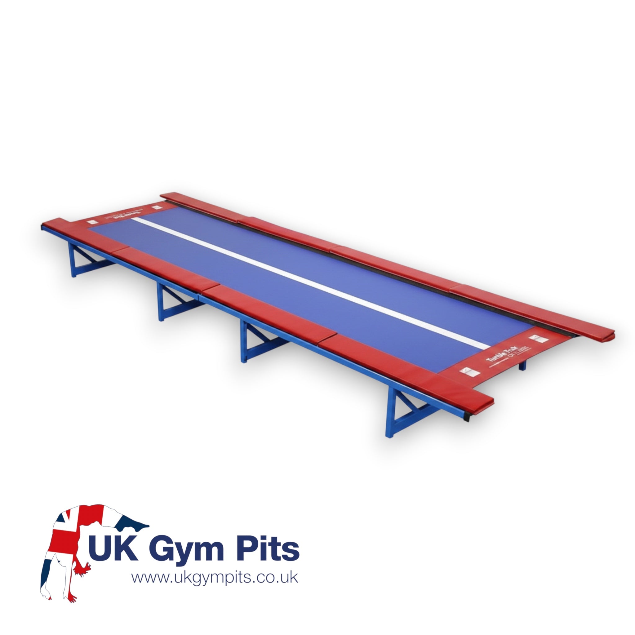 UK Gym Pits Tumbl Trak Xtreme with blue vinyl bed, white center line, and red safety pads on a blue steel frame.
