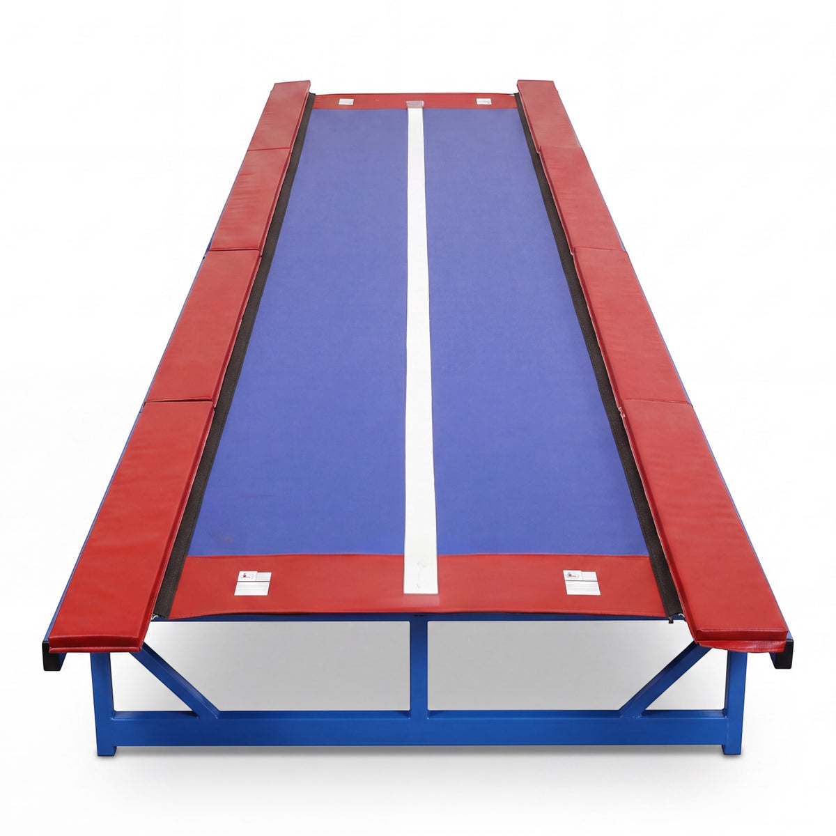 UK Gym Pits Tumbl Trak Xtreme gymnastics track with blue vinyl bed, white center line, and red safety padding.
