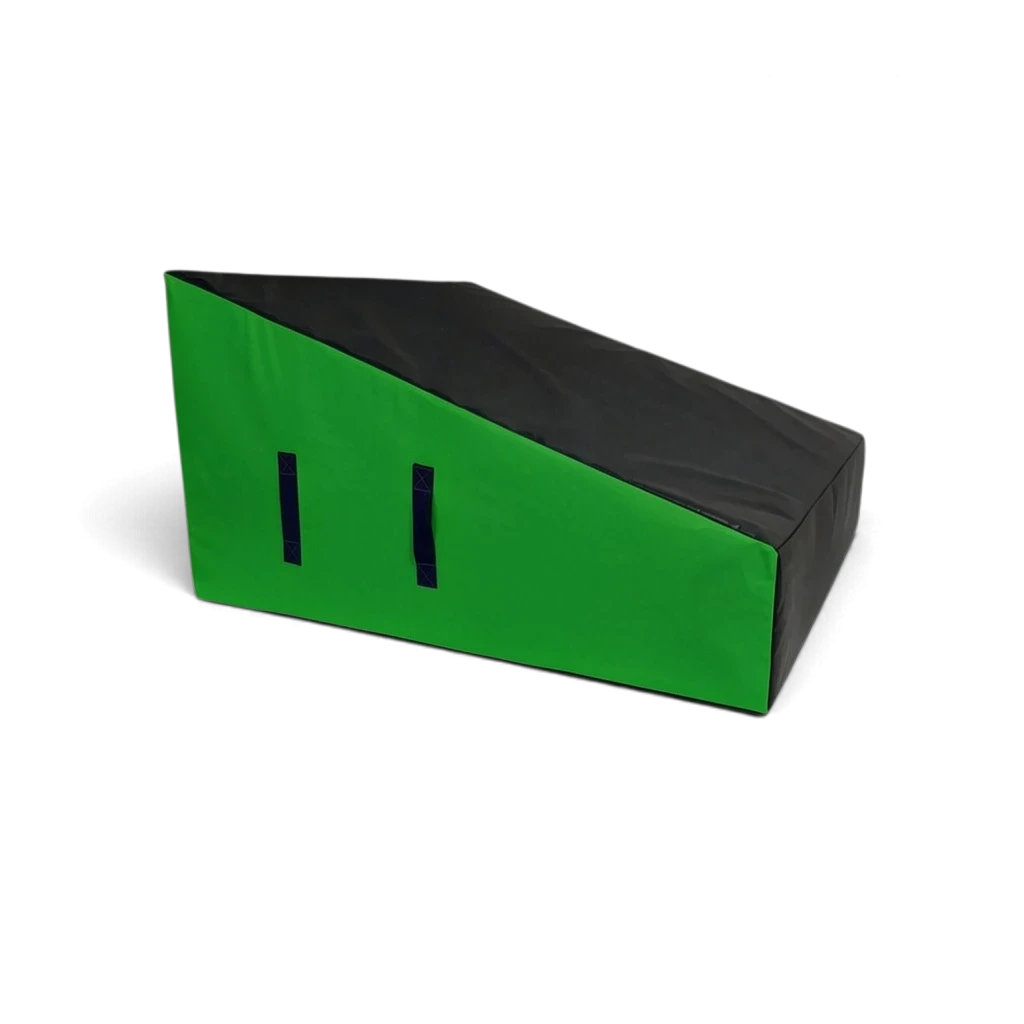 UK Gym Pits wide parkour wedge block in black and green with carry handles for freestyle gymnastics and wall training.