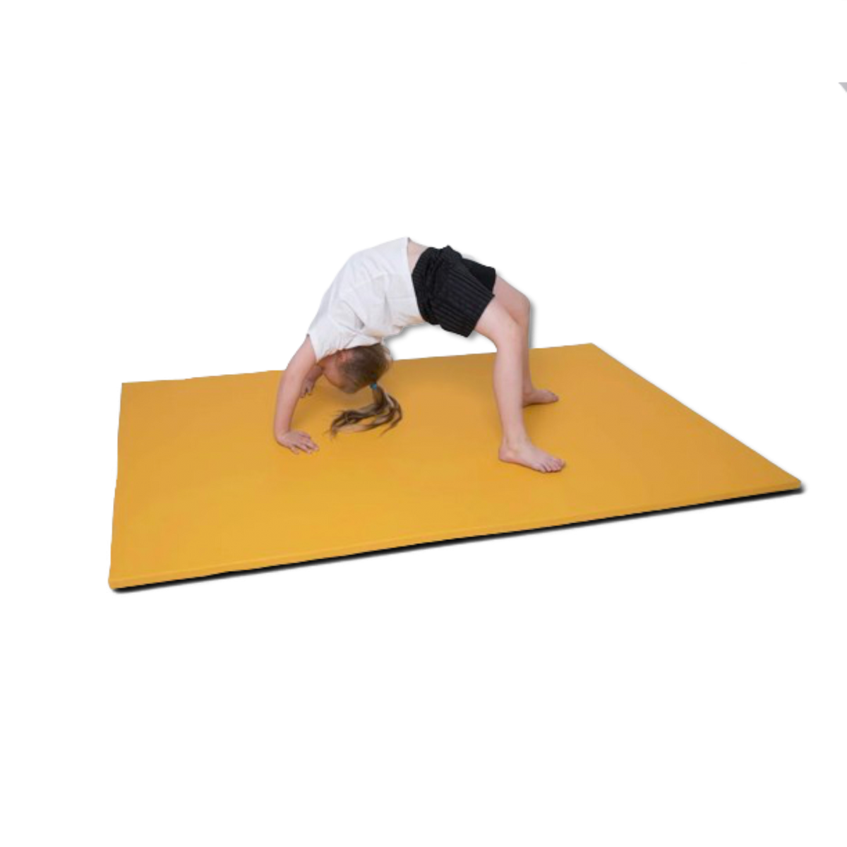 A child performing a backbend on a yellow UK Gym Pits medium-weight chipfoam stretch mat with an anti-slip base.