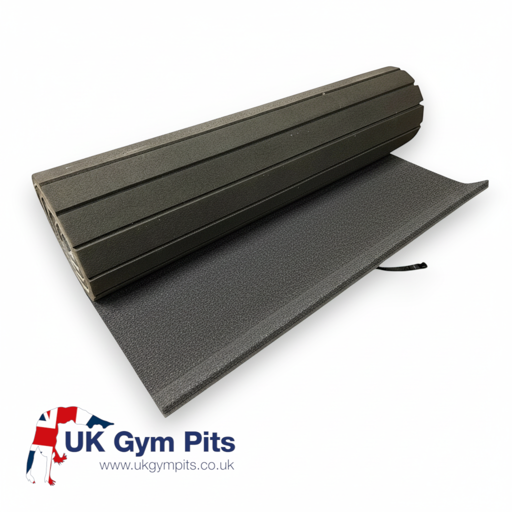 UK Gym Pits flexi carpet mat roll in dark grey with shock-absorbing XPE foam and durable carpeted surface.