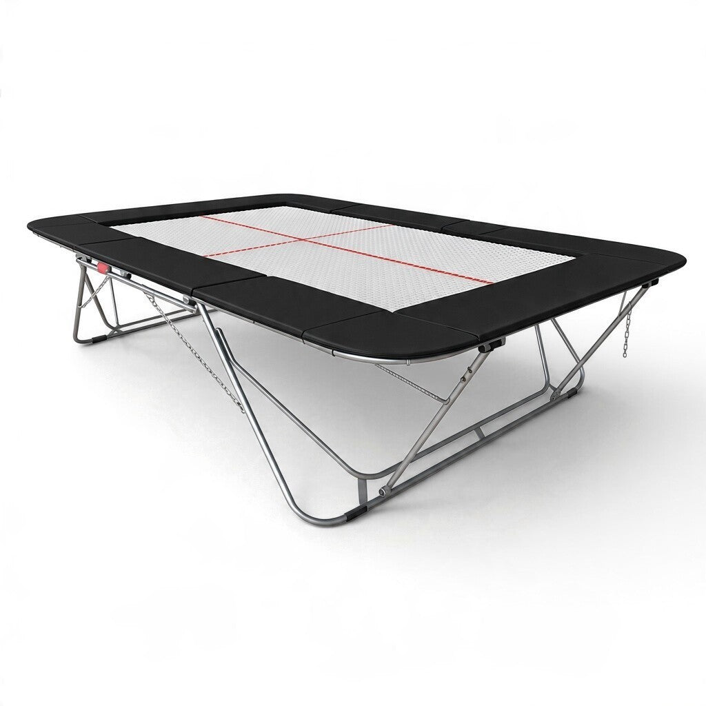 UK Gym Pits 77a standard competition trampoline with a 13mm white web bed and black protective frame pads.