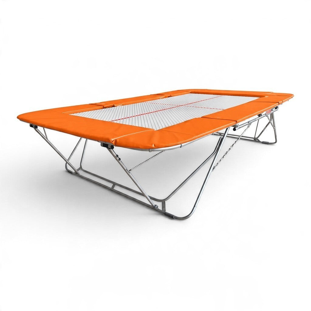 UK Gym Pits 77a standard competition trampoline with orange frame pads and a 25mm web bed on a white background