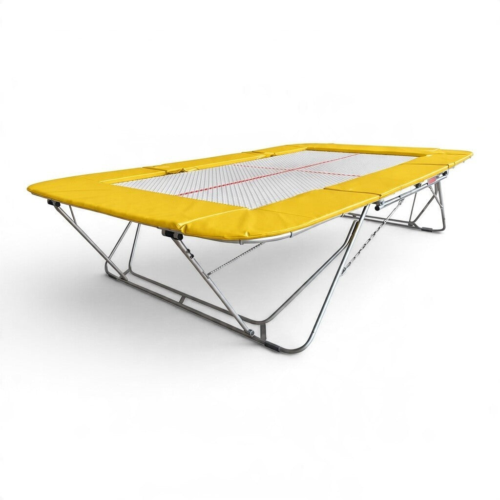 UK Gym Pits 77a standard competition trampoline with a 25mm web bed and yellow protective frame pads.