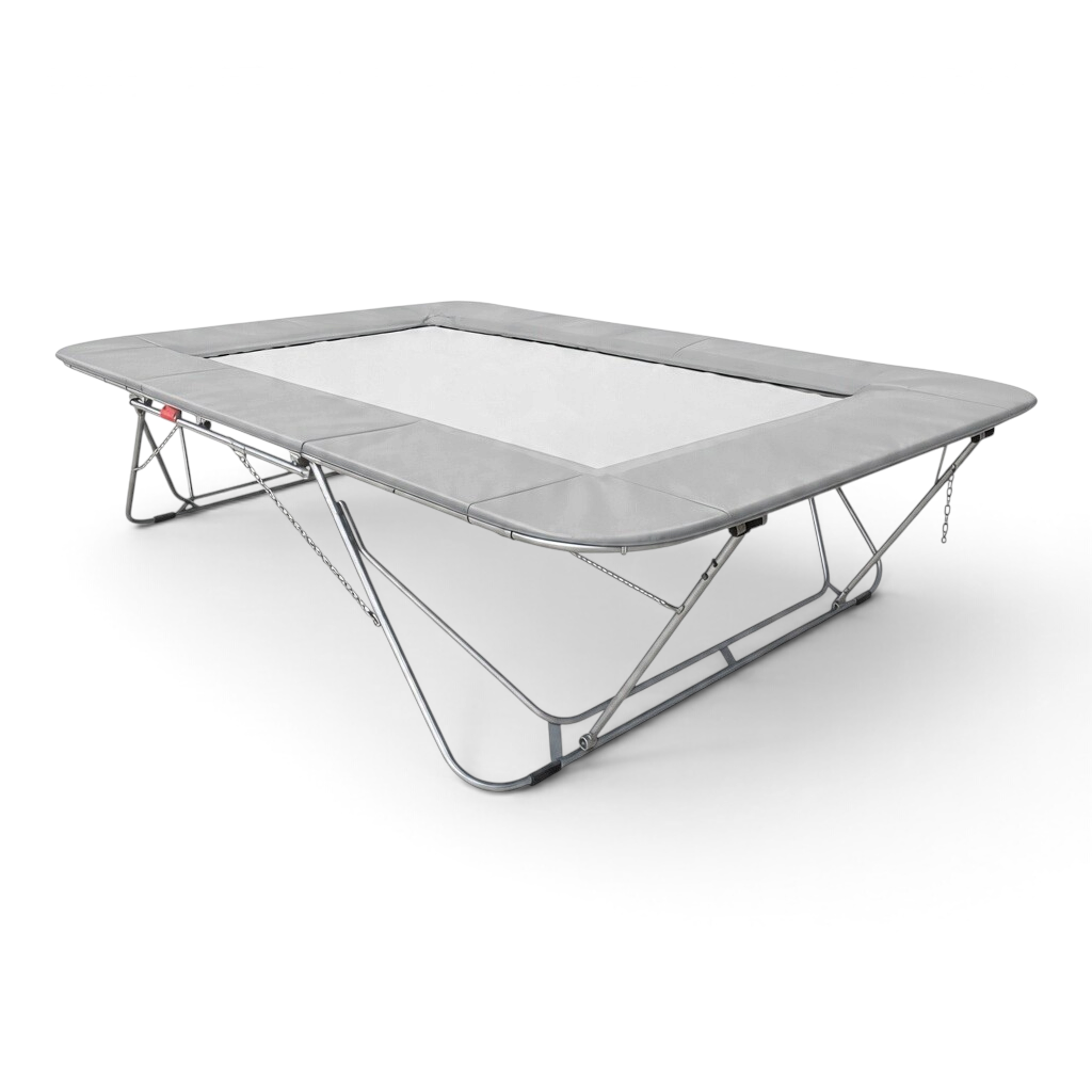 UK Gym Pits 77a standard competition trampoline with a grey super-mesh bed and protective frame pads on a white background