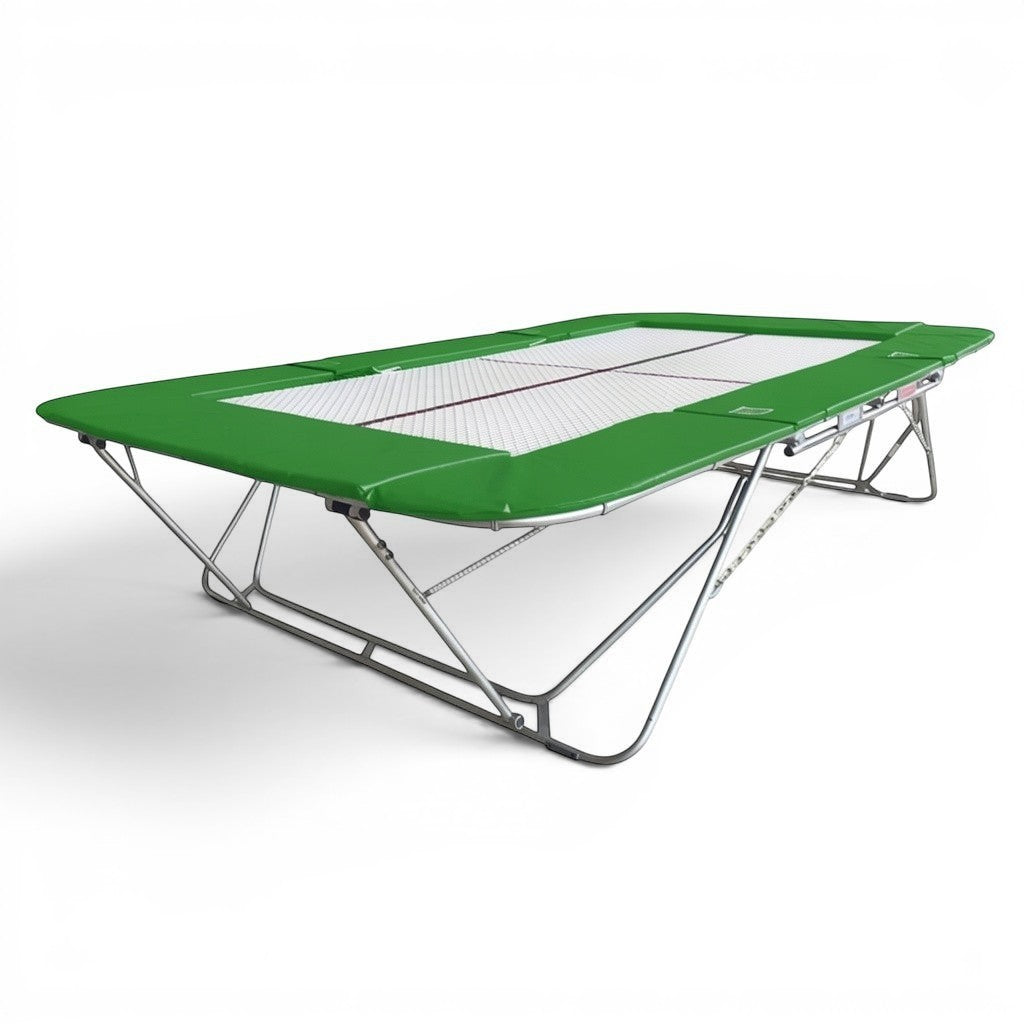 UK Gym Pits 77a standard competition trampoline with a 25mm web bed and green protective frame pads.
