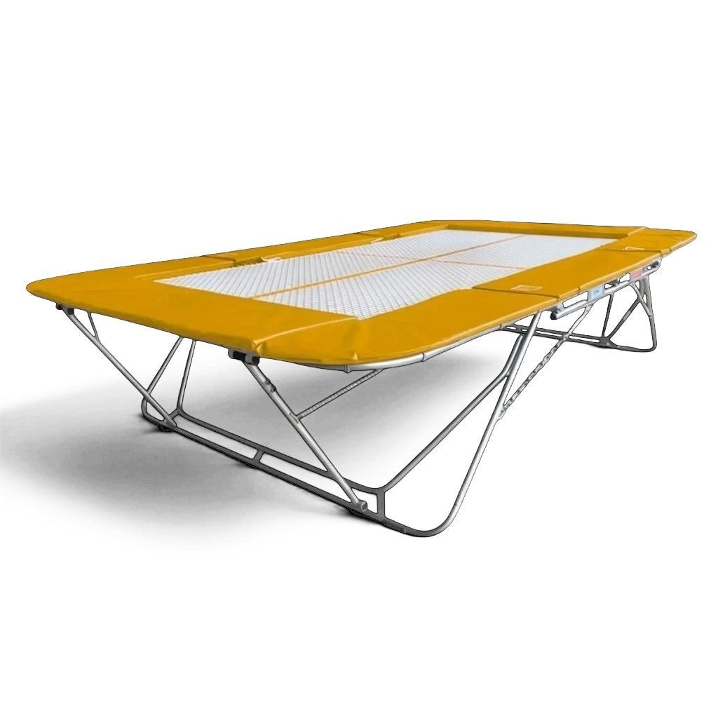 UK Gym Pits 77a standard trampoline with a white super-mesh bed and yellow protective frame pads on a steel frame.