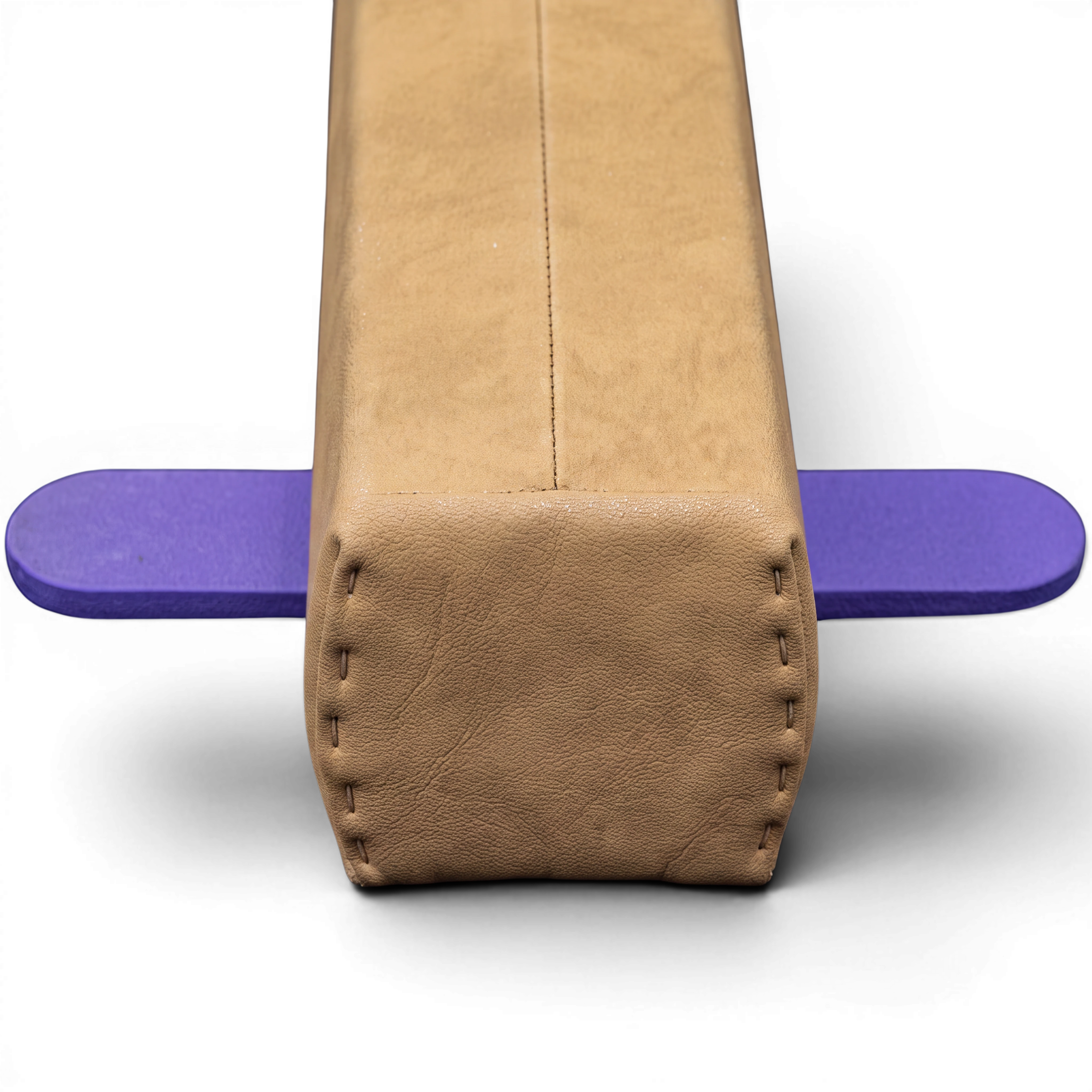 UK Gym Pits Addie beam with synthetic suede finish and purple base, showing the end profile and stitching detail.