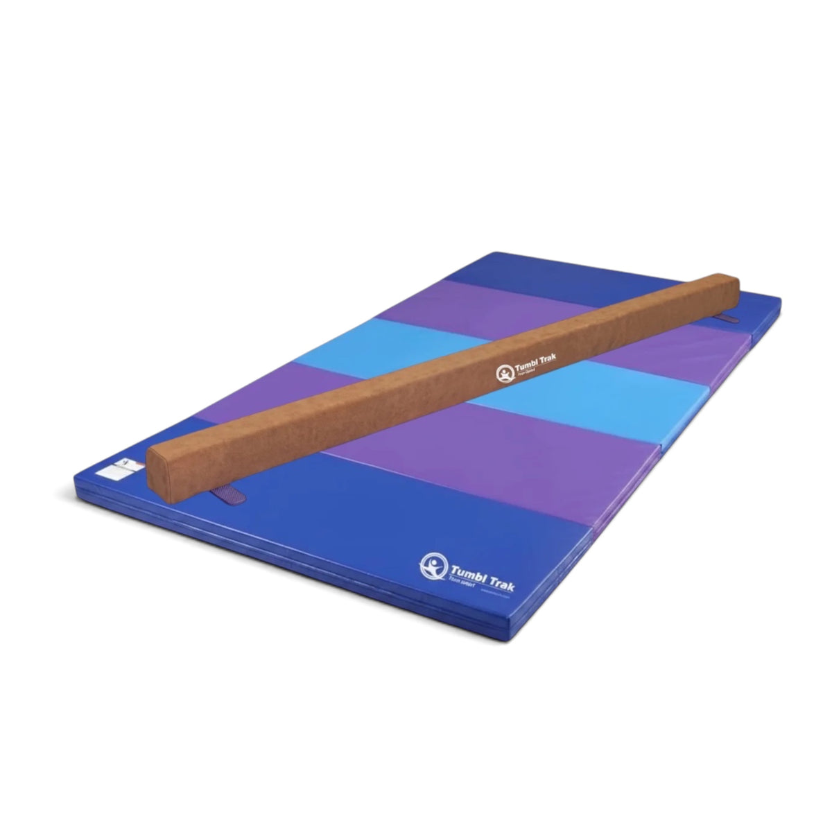 UK Gym Pits Addie beam with synthetic suede finish placed on a blue and purple folding gymnastics tumbling mat.