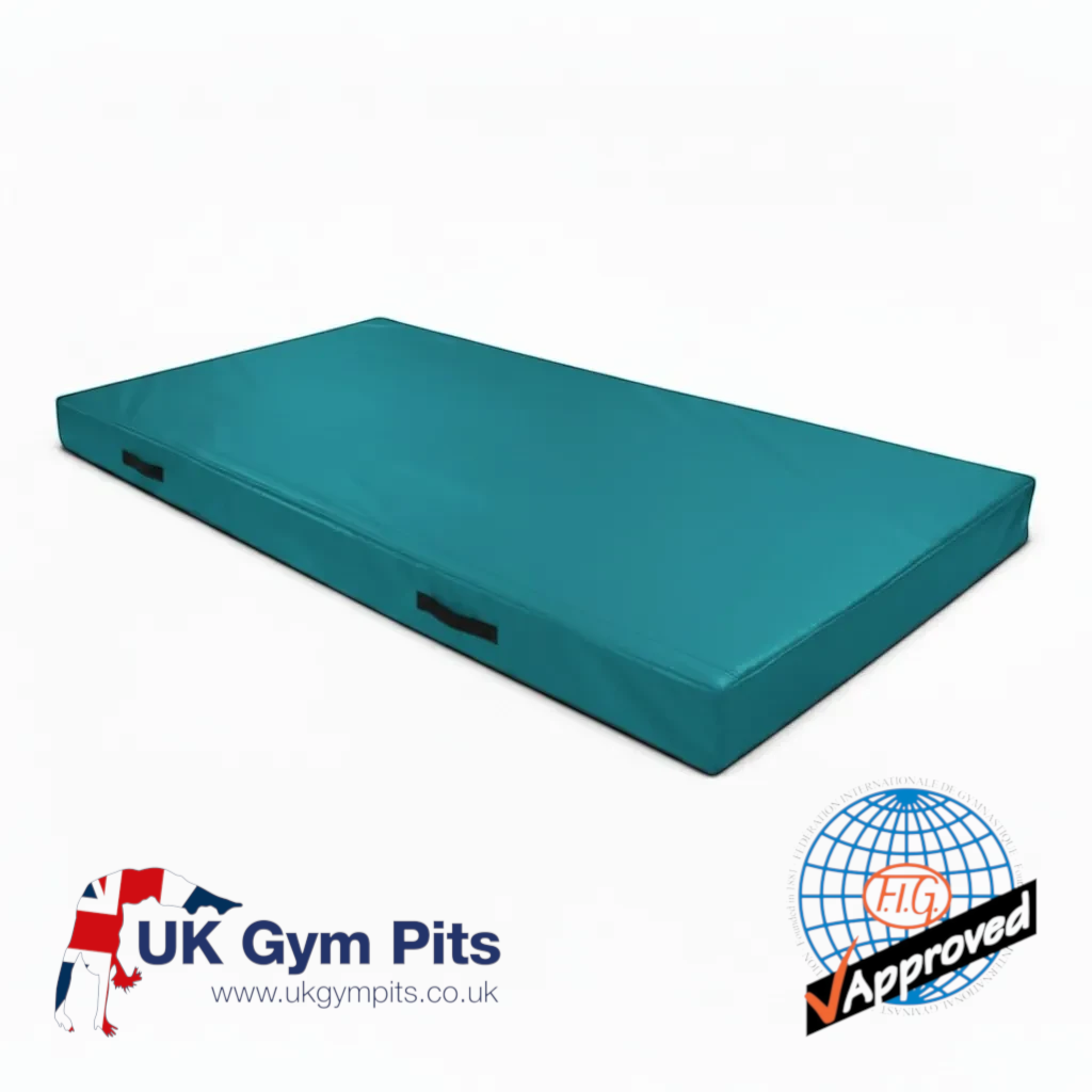 UK Gym Pits FIG spec teal push-on trampoline safety mat with side handles and durable PVC cover