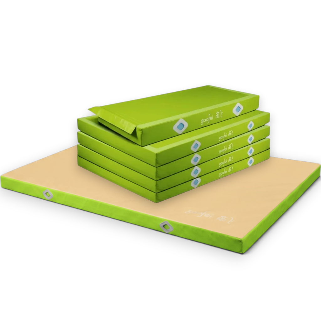 UK Gym Pits Gaofei FIG approved asymmetric bars landing mats in green and beige with non-slip base and Velcro flaps.