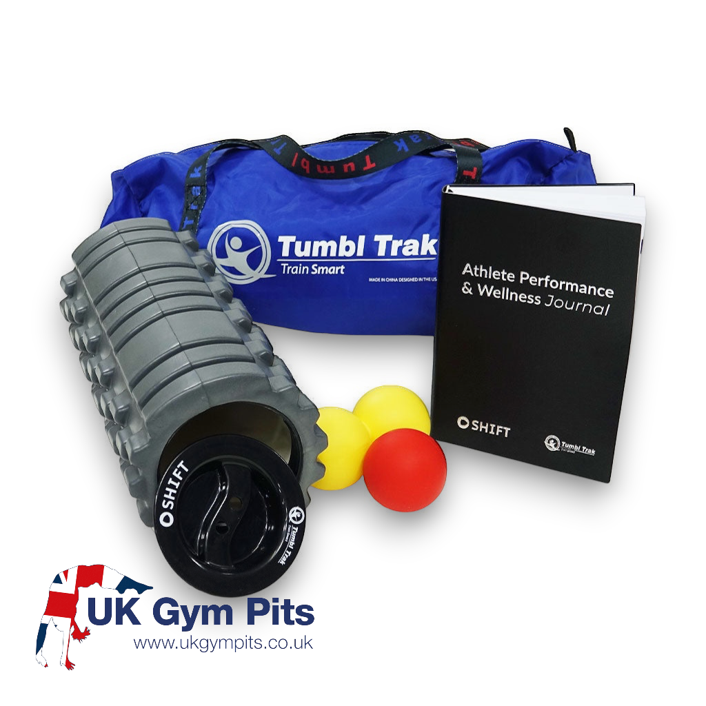 UK Gym Pits athlete wellness and recovery kit with grey foam roller, massage balls, journal, and blue travel bag.
