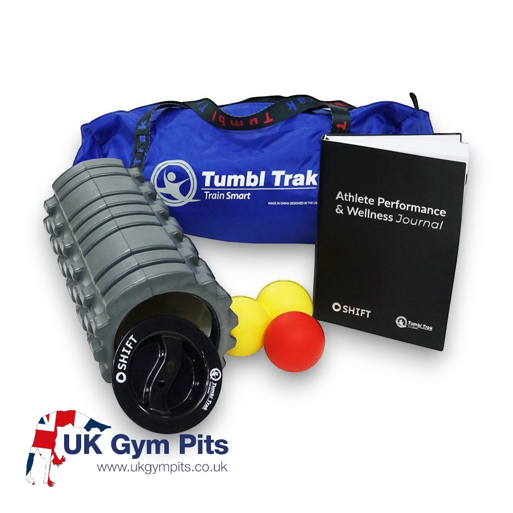 UK Gym Pits athlete wellness and recovery kit with grey foam roller, massage balls, journal, and blue travel bag.