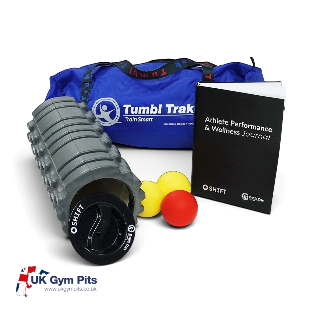 UK Gym Pits athlete wellness and recovery kit featuring a grey foam roller, massage balls, journal, and blue bag.