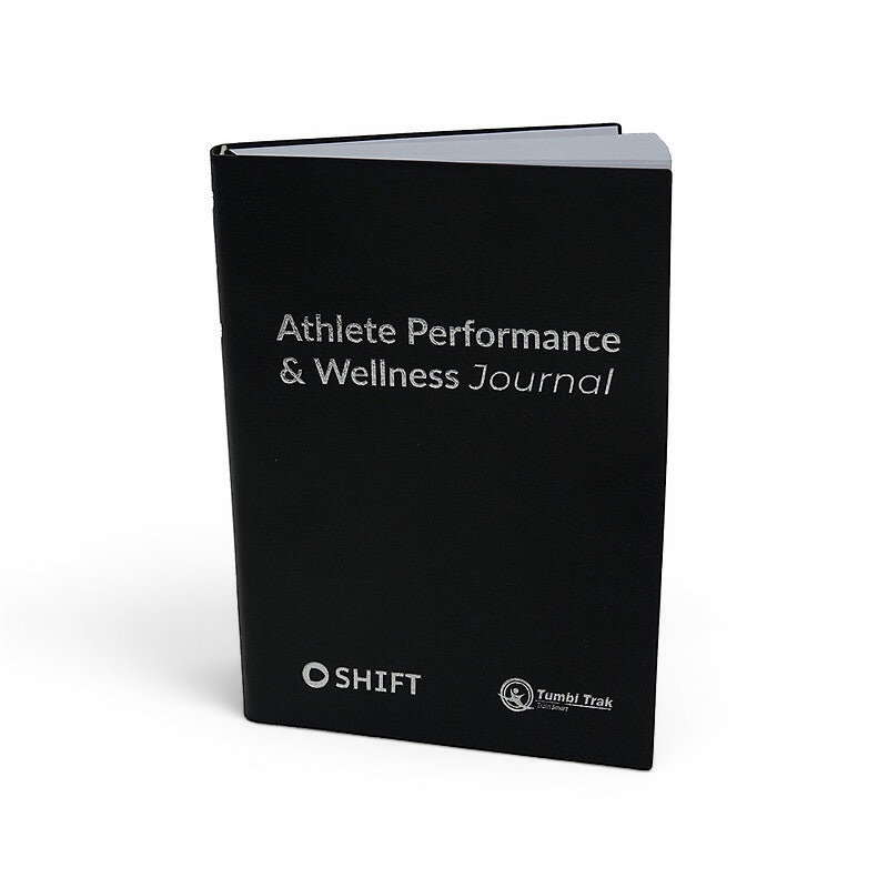 UK Gym Pits black Athlete Performance & Wellness Journal with silver text and Shift and Tumbl Trak branding.