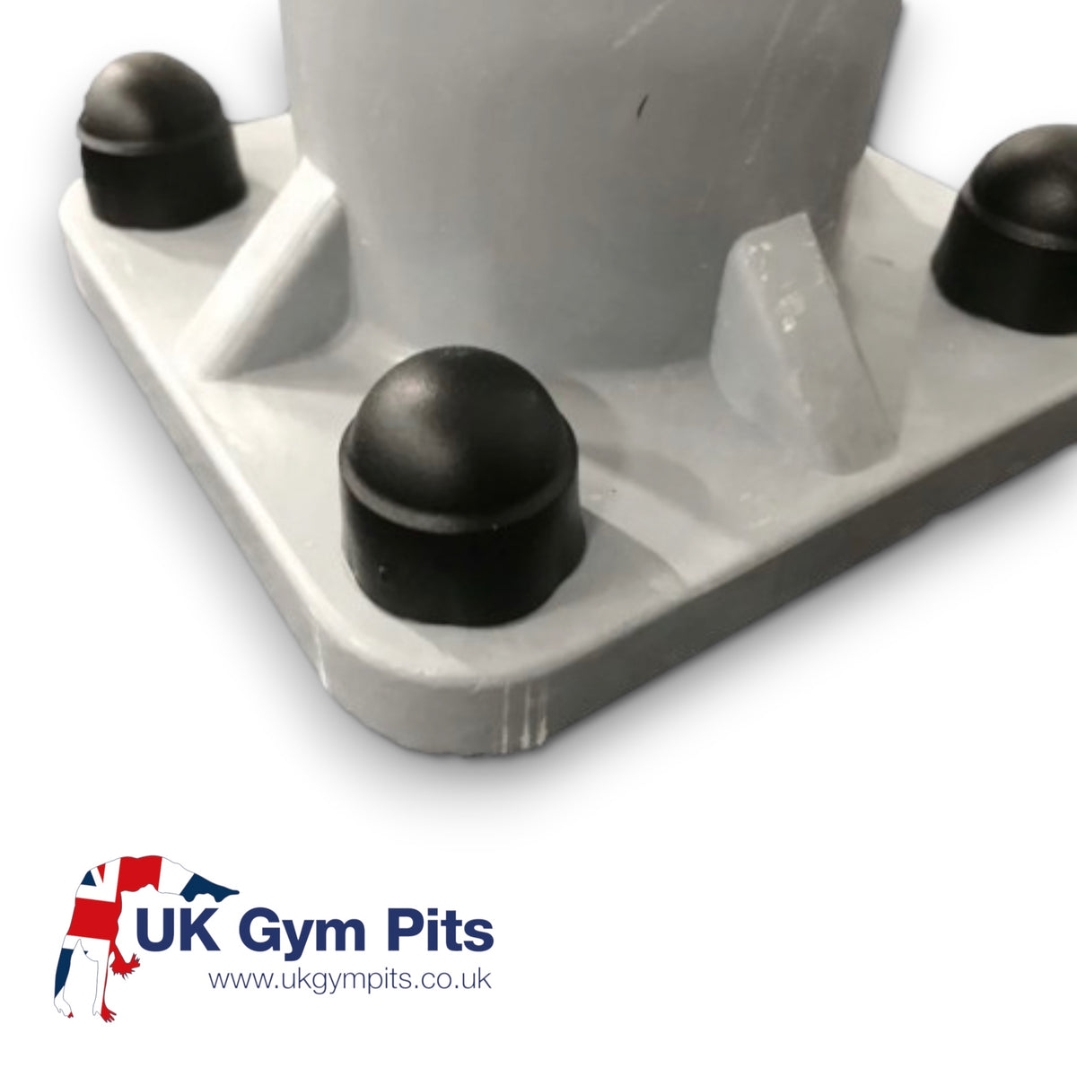 UK Gym Pits black plastic protective caps covering stainless steel bolt heads on a grey GRP base plate fixing