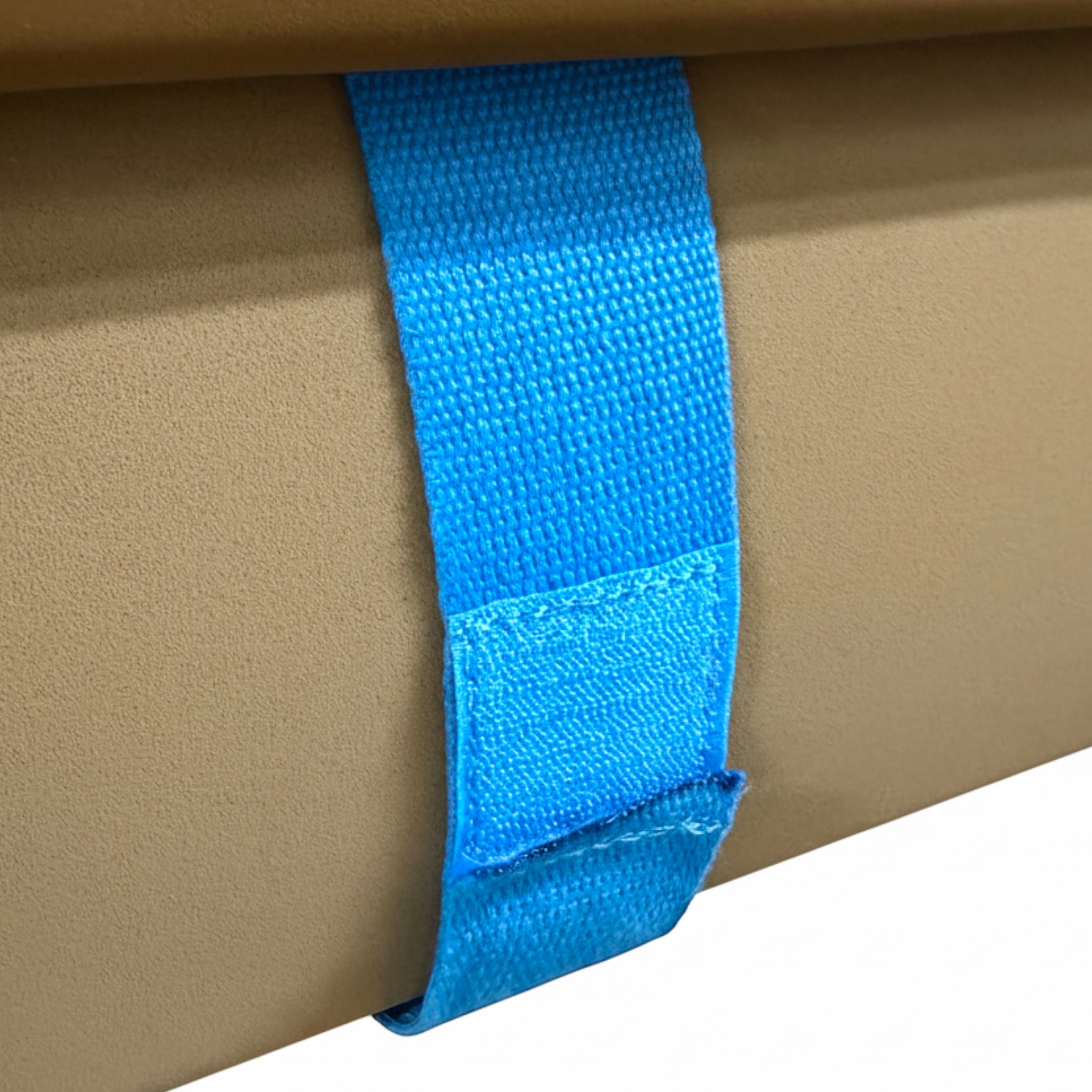 UK Gym Pits Gaofei beam enlarger featuring a tan surface and a bright blue Velcro strap for secure attachment